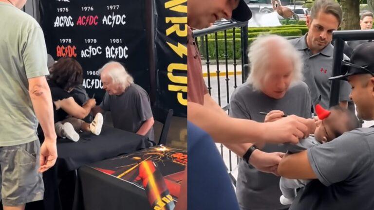 Angus Young autografa bebê durante evento do AC/DC e cena viraliza